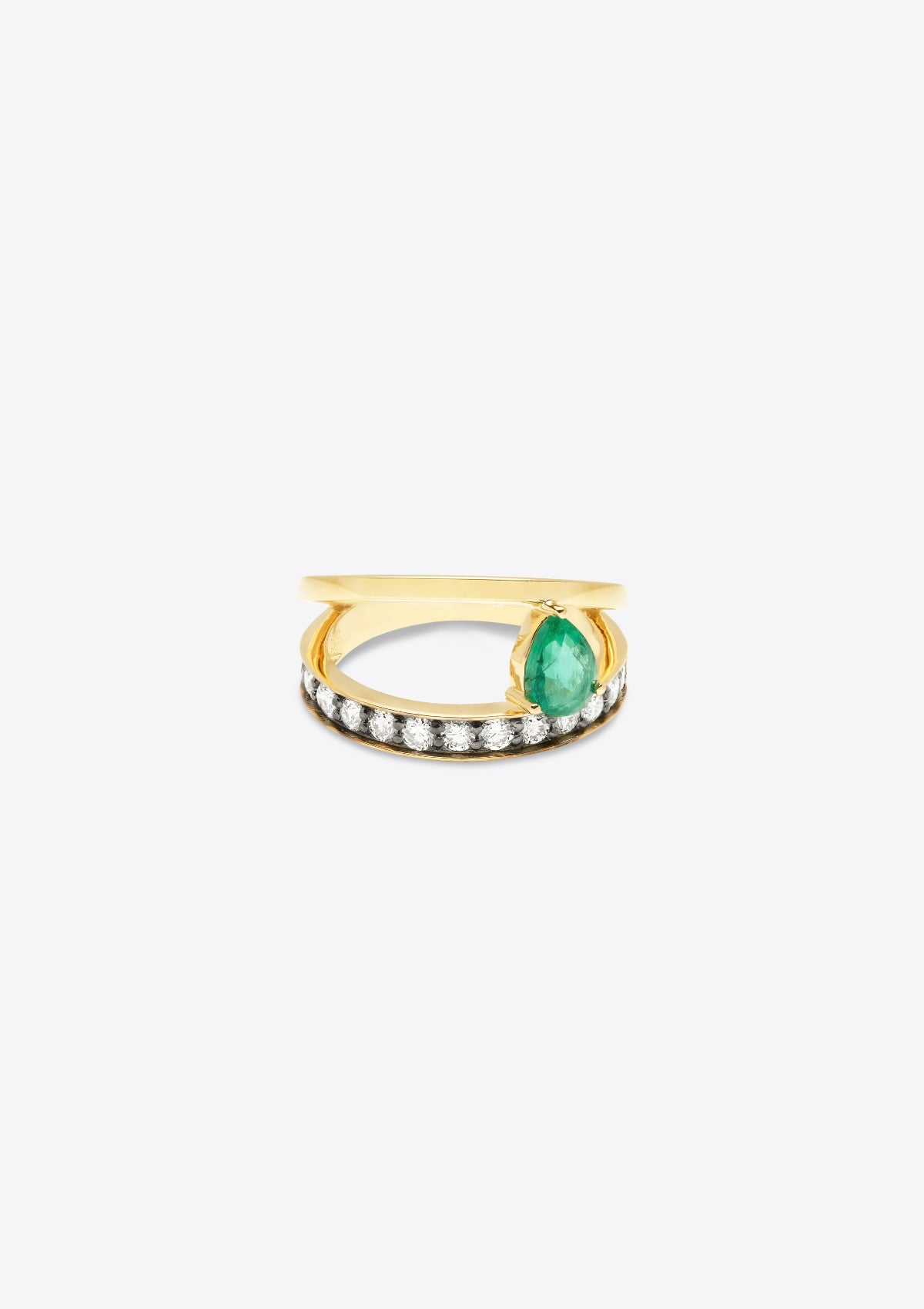 ring with 1 diamond-set gold band with a plain gold band asymmetrically above, bands joined by a pear emerald. front view, on grey background