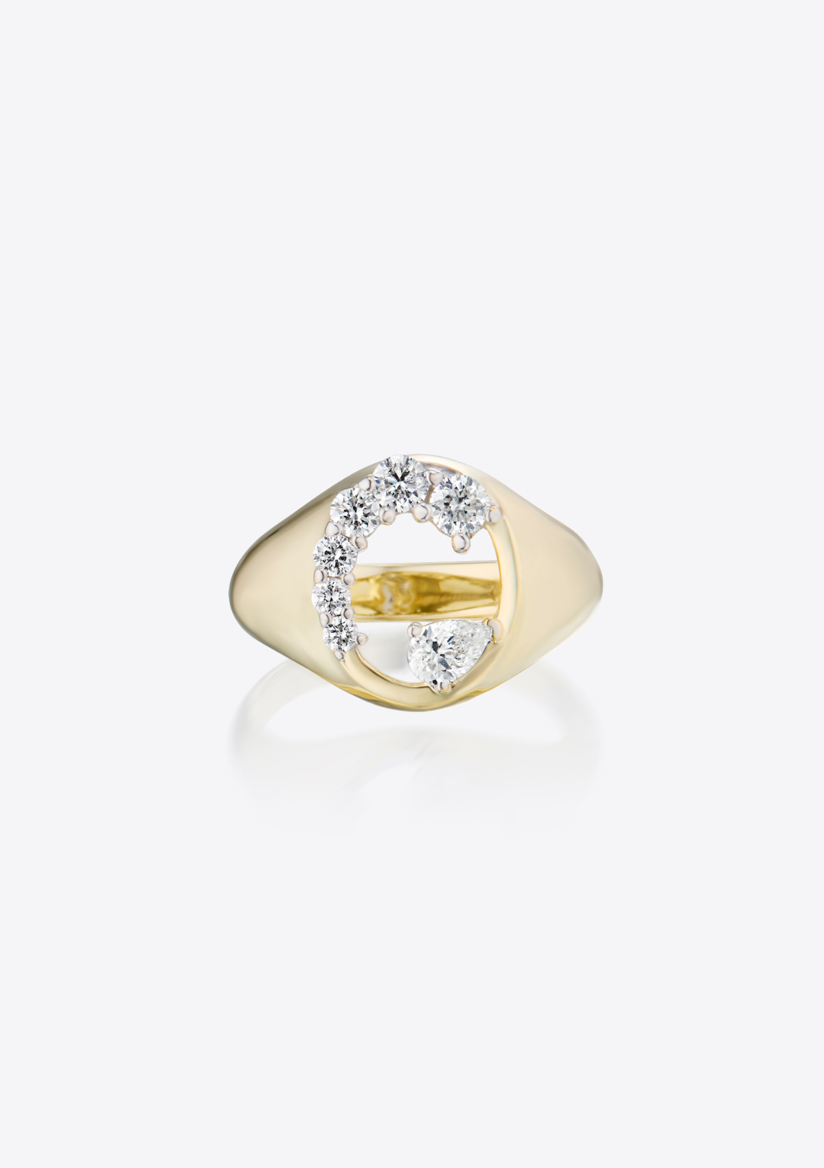 Gold signet ring with round graduating diamonds and a single pair diamond on a grey background. front view