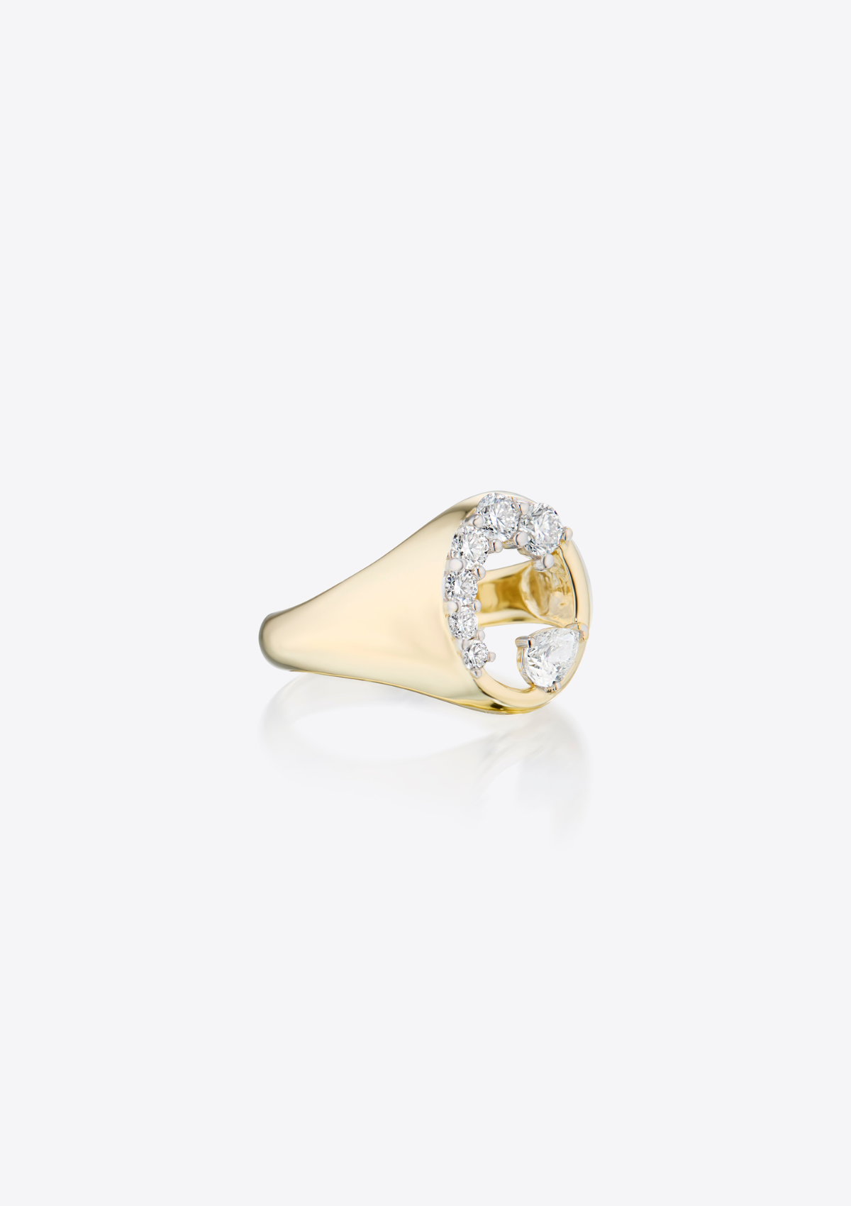 Gold signet ring with round graduating diamonds and a single pair diamond on a grey background. front view