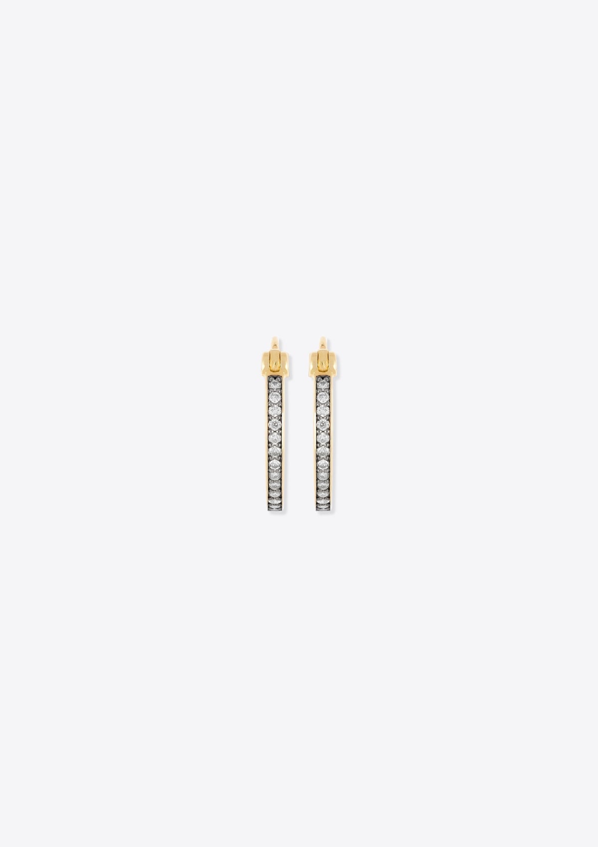 front view of gold hoop earrings with small diamonds and black rhodium on a grey background