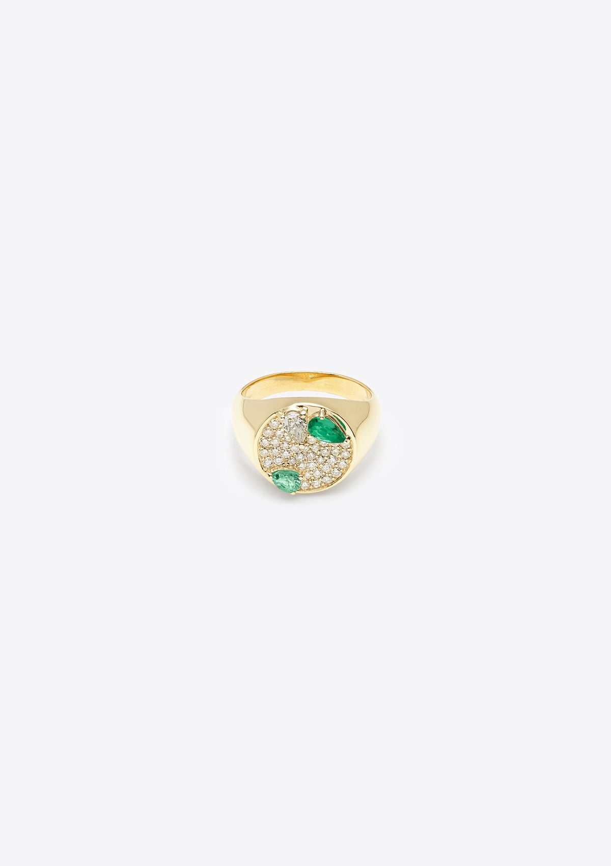 Front view of yellow gold signet ring with small round diamonds, pear-shaped diamond and pear-shaped emeralds on a grey background