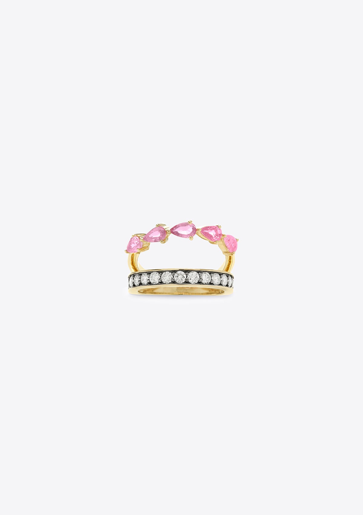 side view of gold ring with 2 joining bands with pink sapphires and round diamonds on grey background