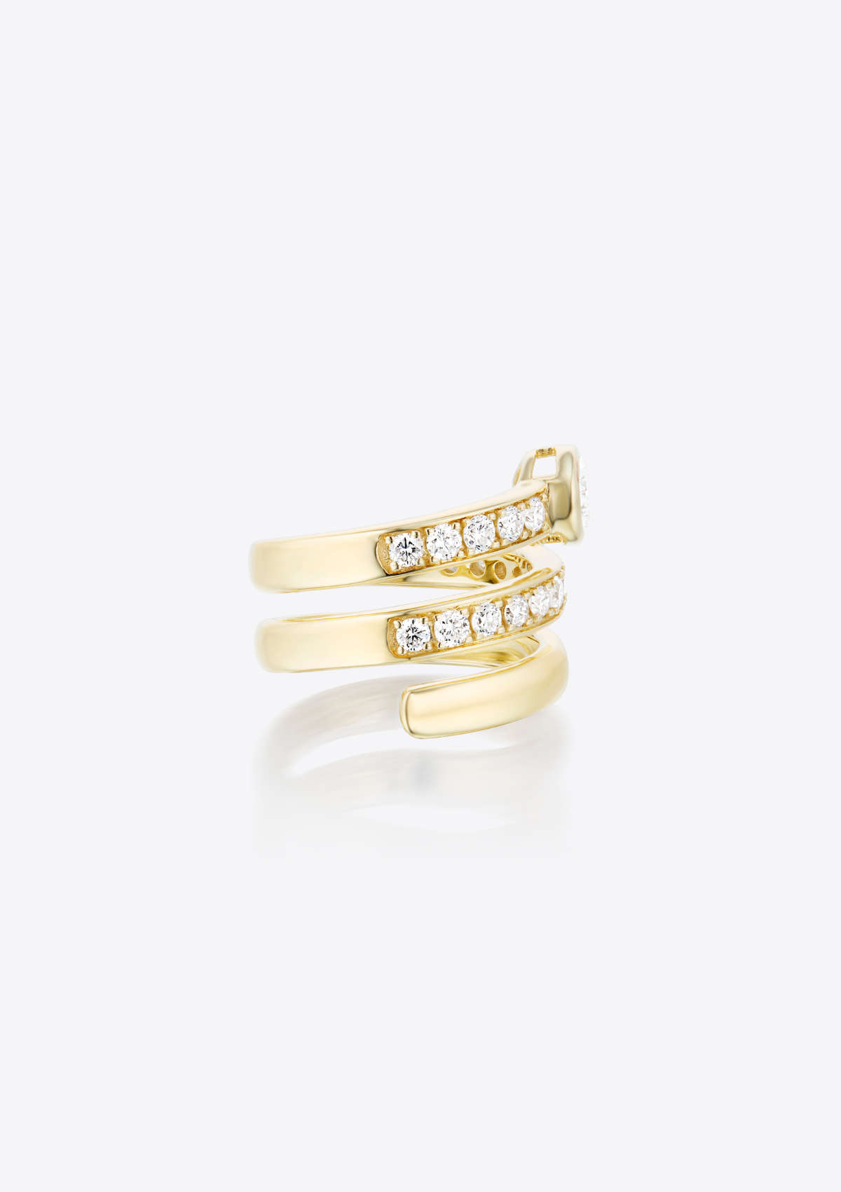 Yellow gold ring with small round diamonds and a main pear-shaped diamond on a grey background