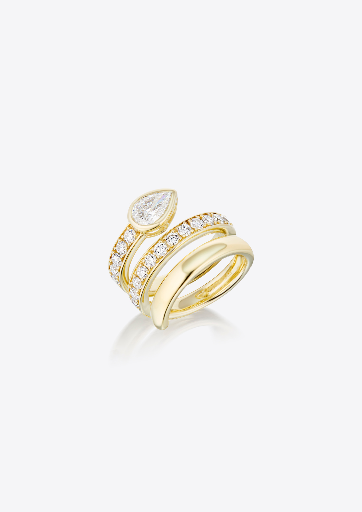 Yellow gold ring with multiple bands with round small diamonds and a central pear-shaped diamond on a grey background