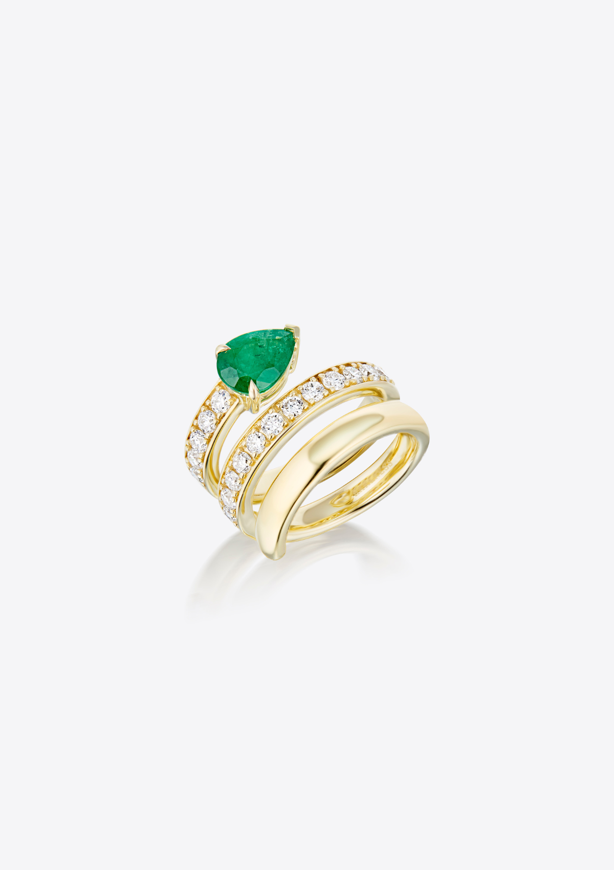 Front view of yellow gold multi band ring with small diamonds and a pear-shaped emerald on a grey background